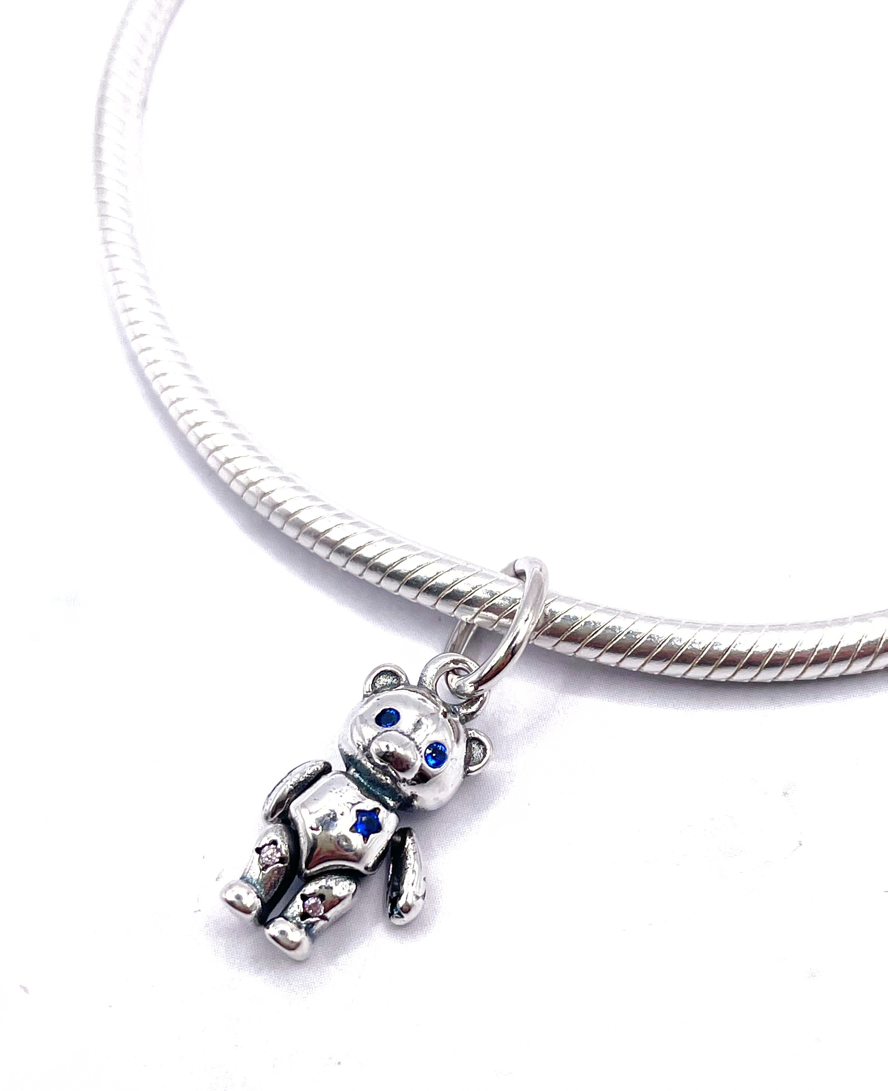 Charm Osito móvil con estrella y circonias azules