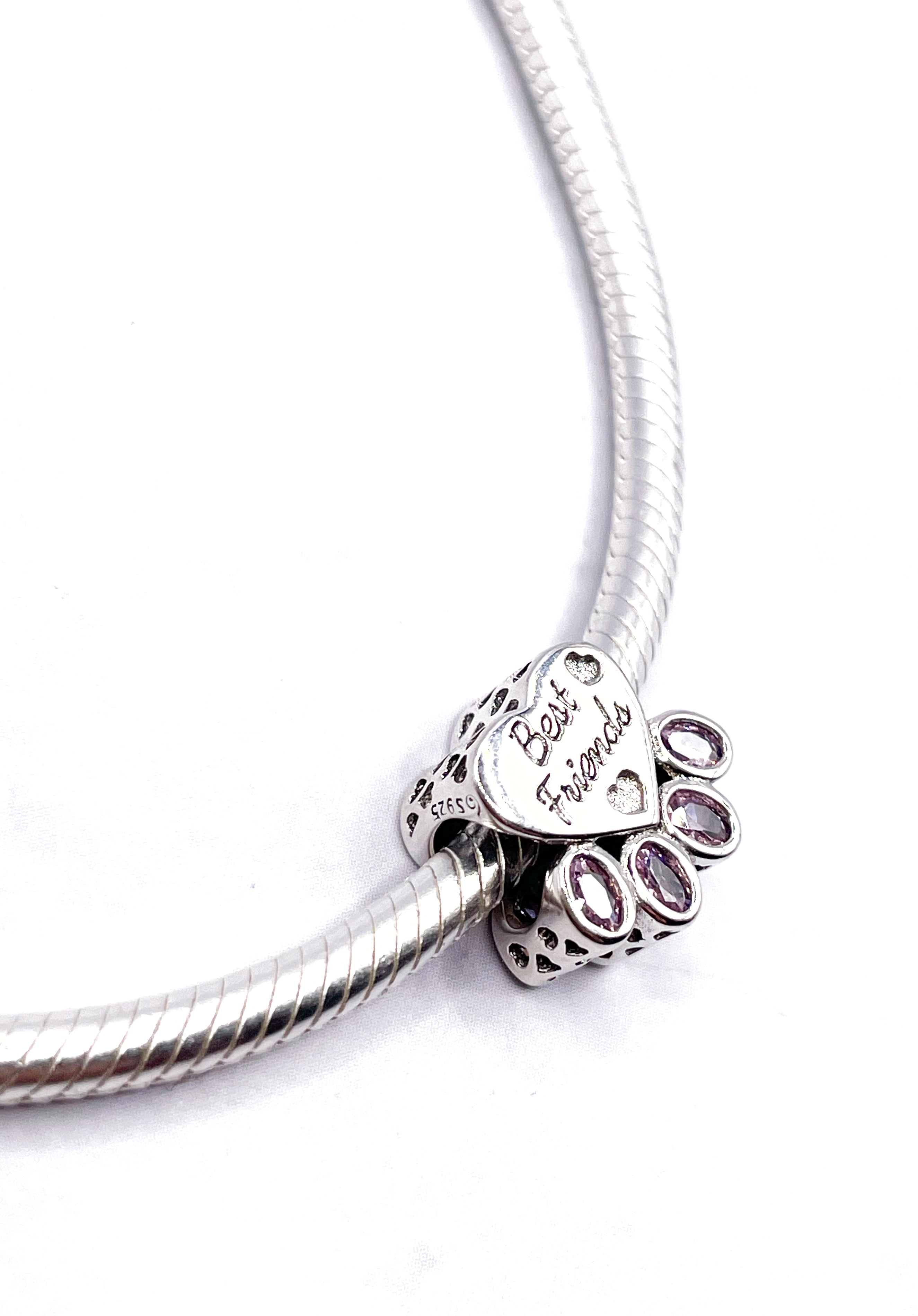 Charm Huella con circonias rosadas “Mejor amig@“