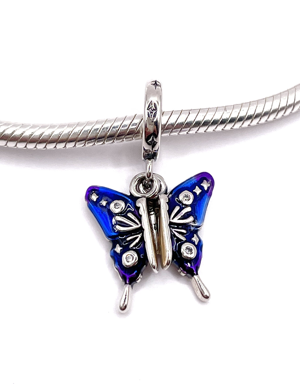 Charm Mariposa azul “Únic@“