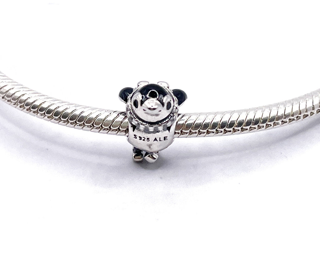 Charm Pingüino esquiador