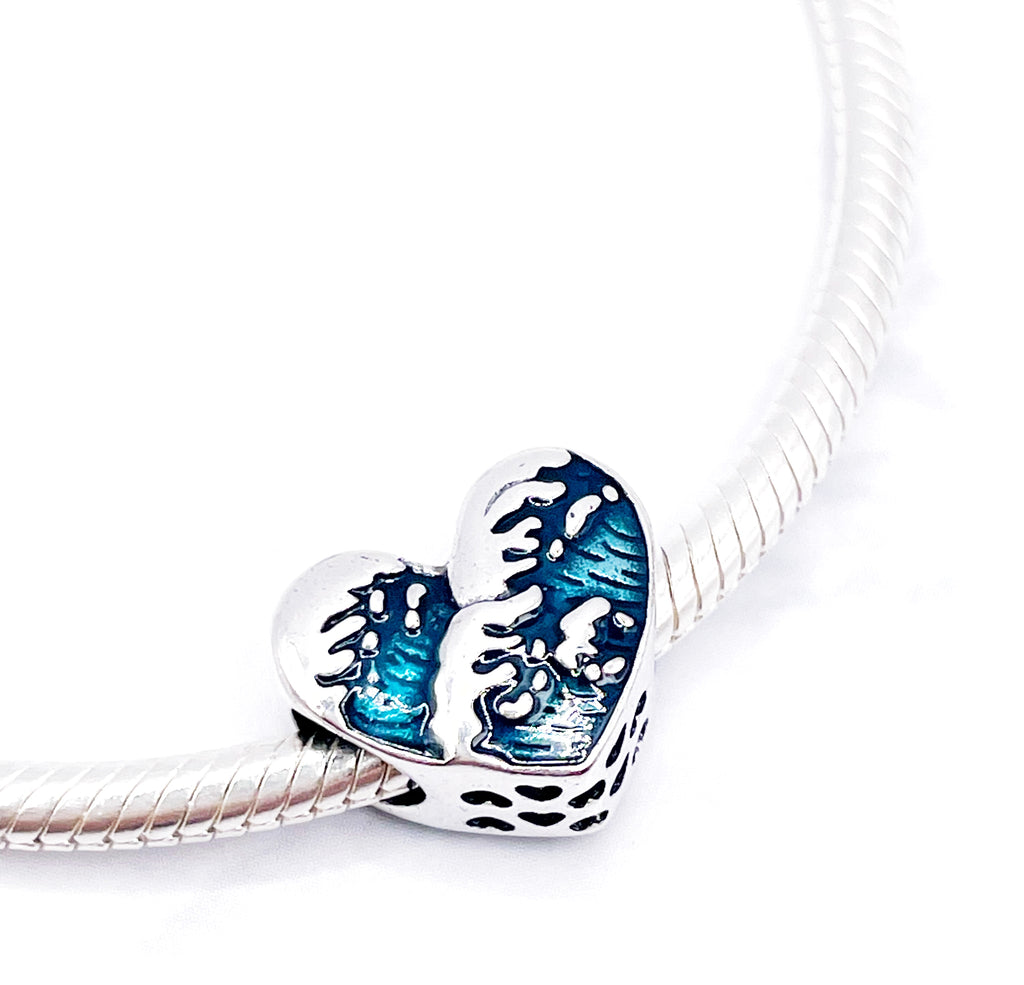 Charm Corazón olas “Mi corazón seguirá adelante”