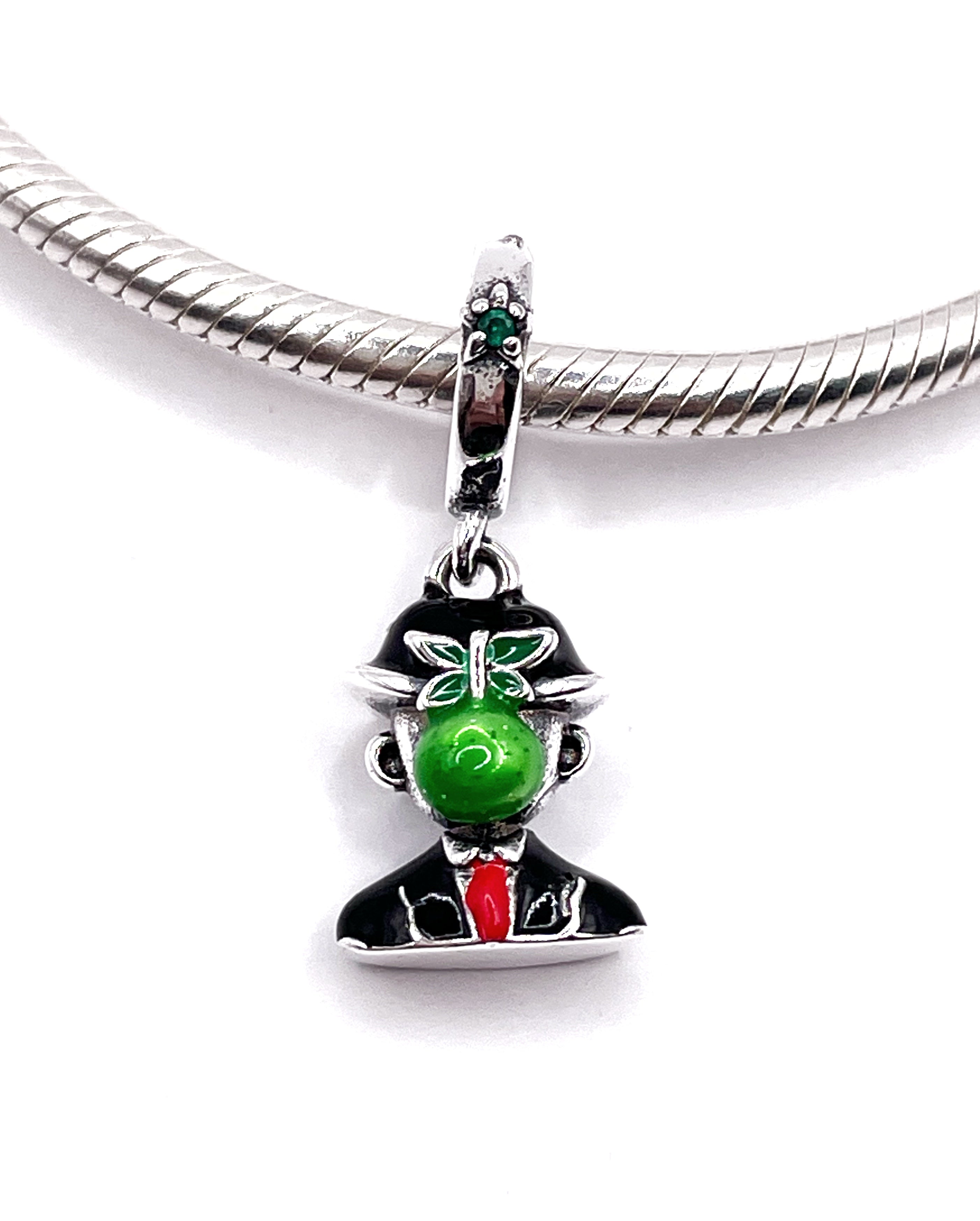 Charm El hijo del hombre de Magritte