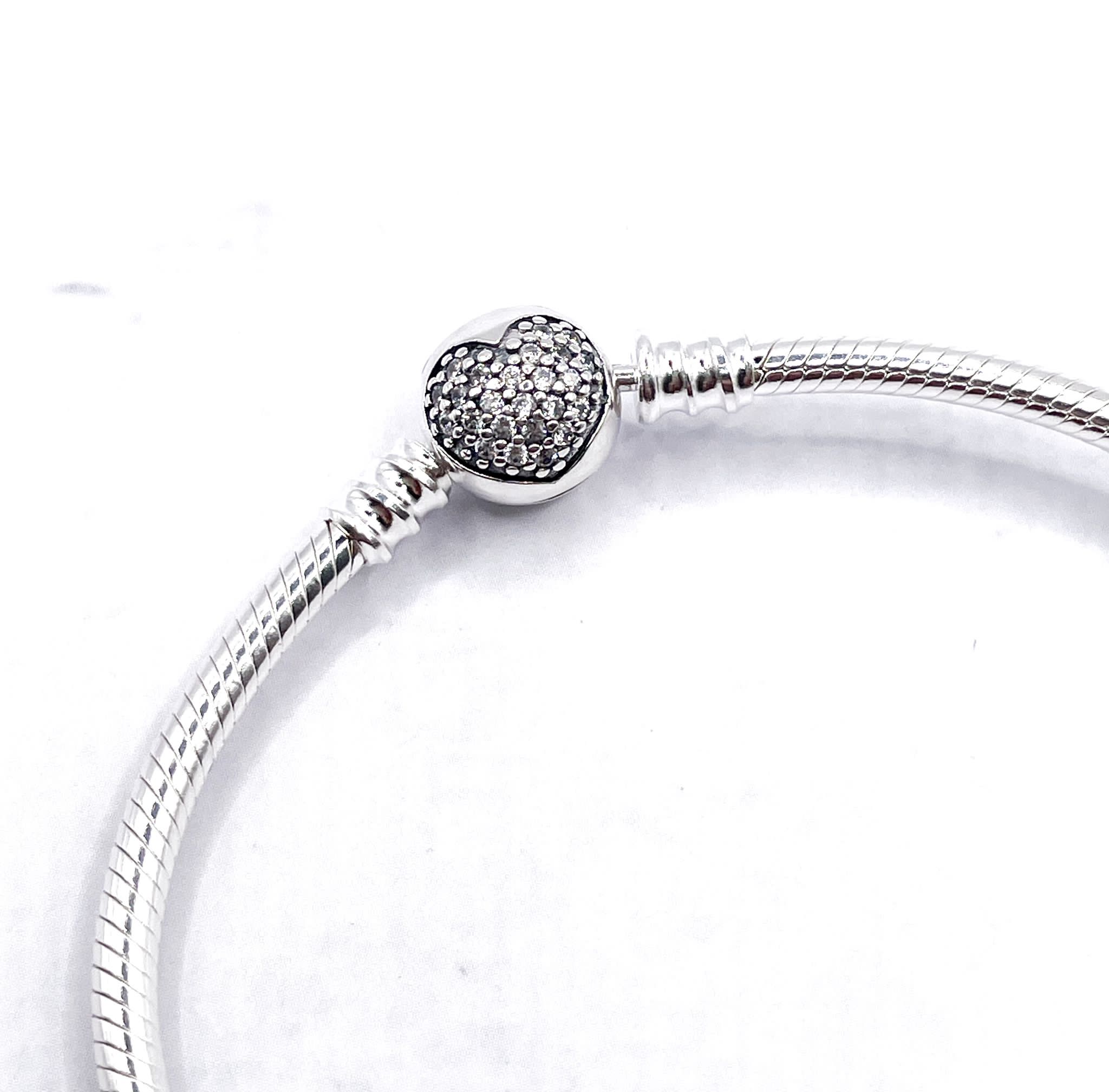 Pulsera flexible broche bolita corazón